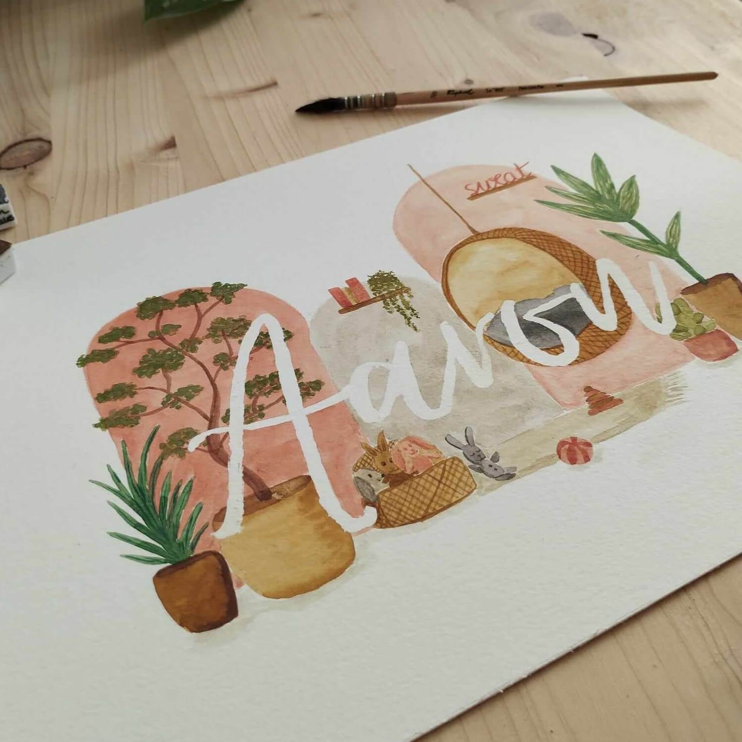 Affiche prénom décorative personnalisée dans les ton terracotta. Ambiance cosy et végétale illustrée à l'aquarelle. Idée de cadeau de naissance unique et originale
