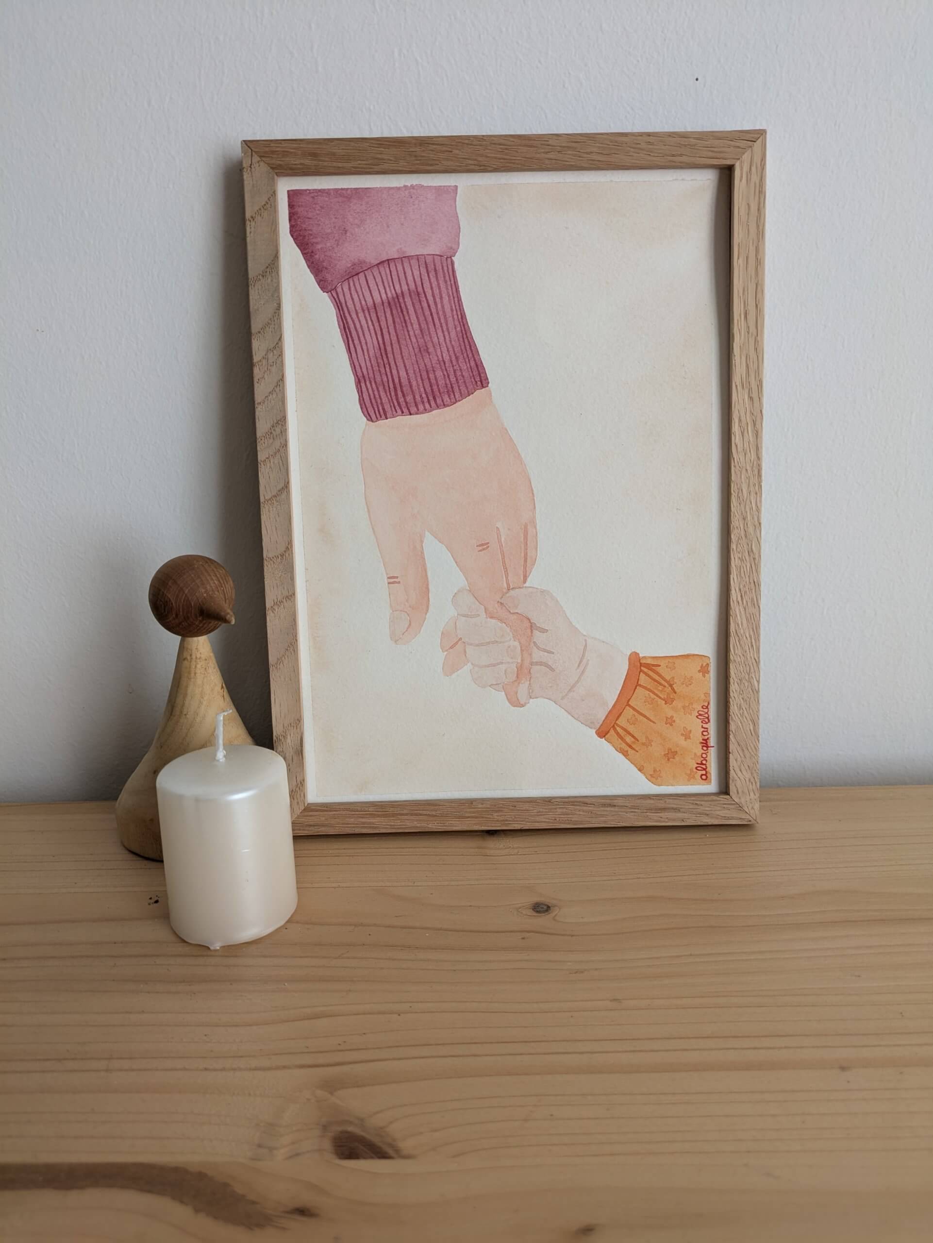 Illustration à l'aquarelle représentant la main d'une fillette qui tient celle de sa mamie. Cadeau idéal pour la fête des grands-mères