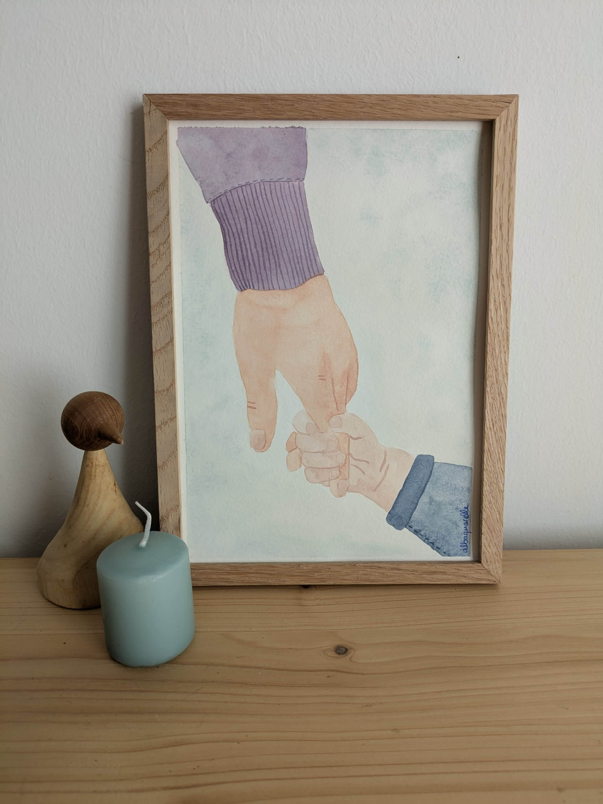 illustration à l'aquarelle représentant la main d'un garçon qui tient celle de sa mamie. Cadeau idéal pour la fête des grands-mères